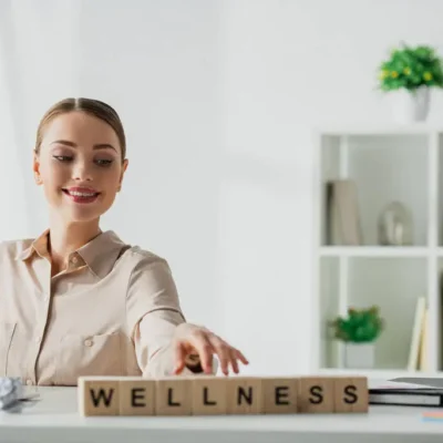 A women setting the wellness baord in office
