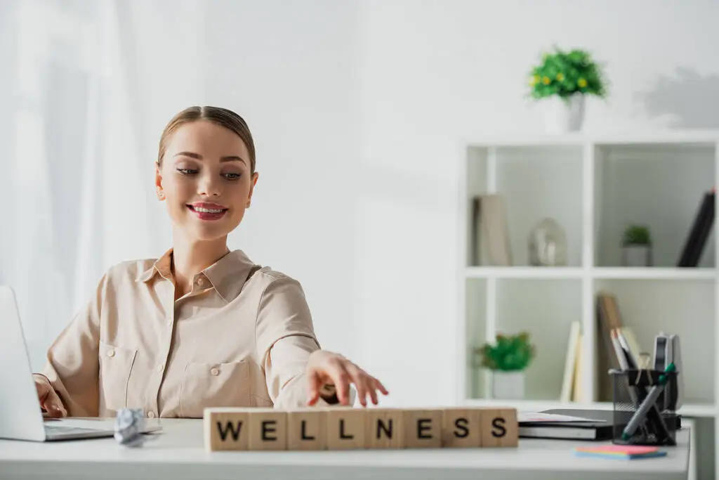 A women setting the wellness baord in office